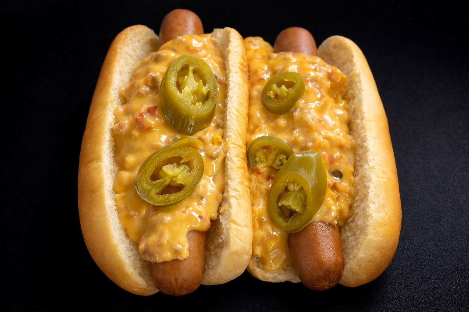 Rotel hot dogs with queso and jalapeños