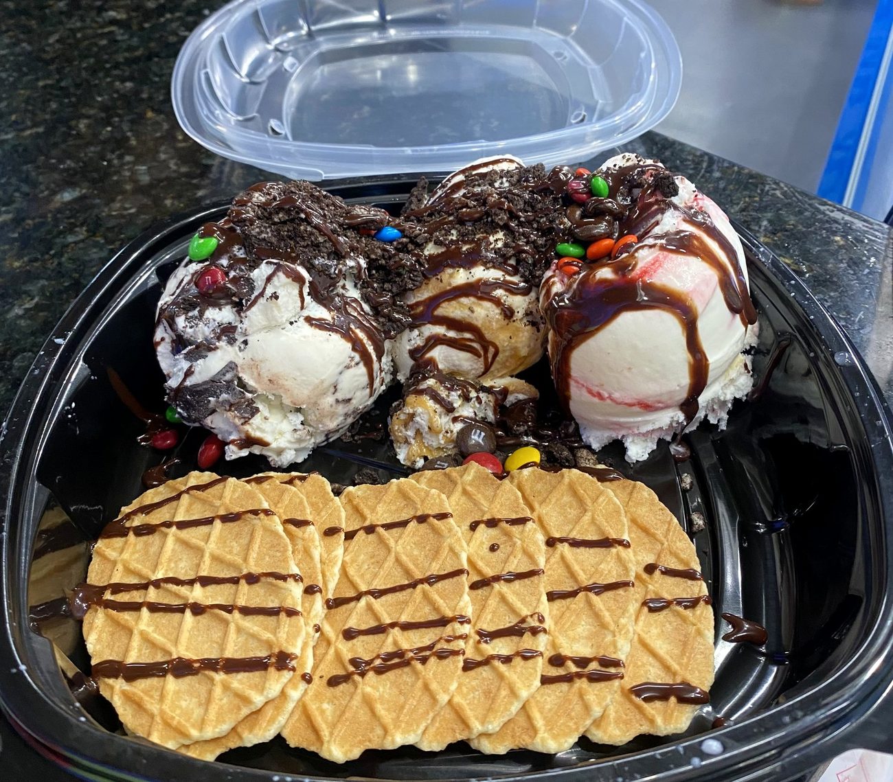 Three scoops with candy and waffle chips